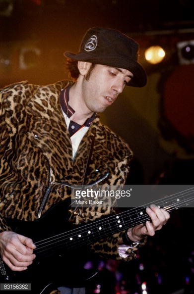 mick-jones-of-big-audio-dynamite-during-a-live-show-at-the-town-club-picture-id83156382
