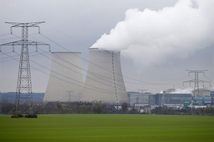 Steam rises from the cooling towers of the Electricite de France nuclear power station at Nogent-Sur-Seine, France